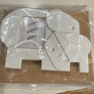 Tupperware Nuzzles Elephant magnetic picture frame - 1990s new in package